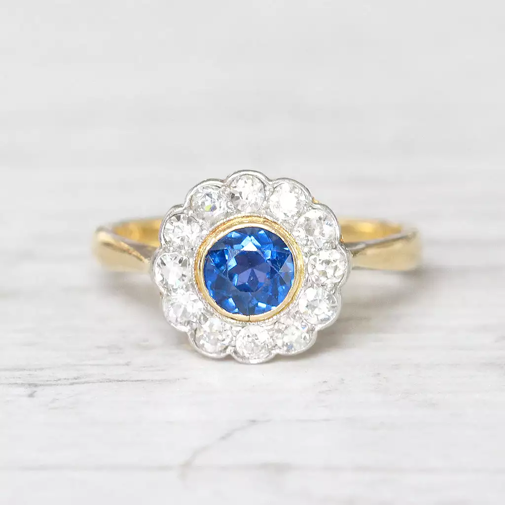 Edwardian 0.60 Carat Sapphire and Old Cut Diamond Cluster Ring