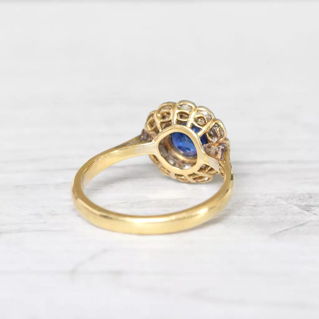 Edwardian 0.60 Carat Sapphire and Old Cut Diamond Cluster Ring