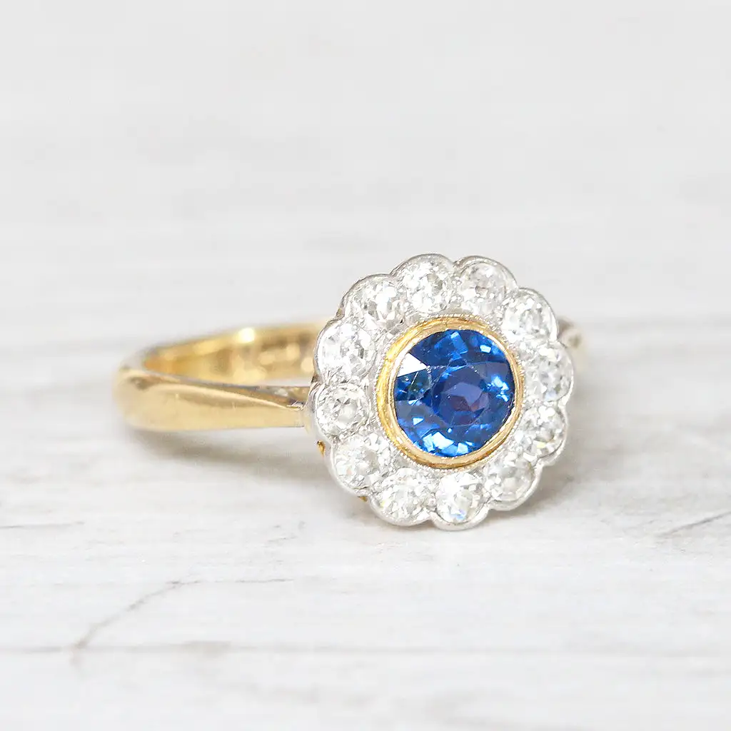 Edwardian 0.60 Carat Sapphire and Old Cut Diamond Cluster Ring